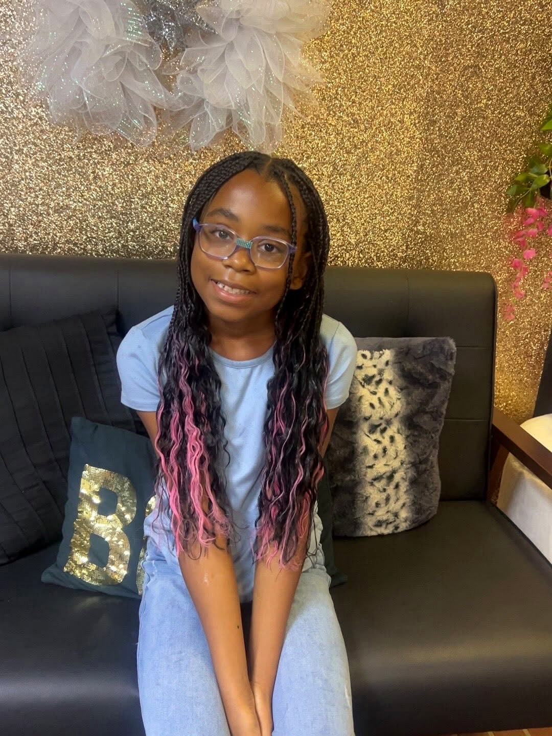 Kids’ pink-streaked wavy braids at Berly's Multi Culture Hair Braiding, McKeesport PA